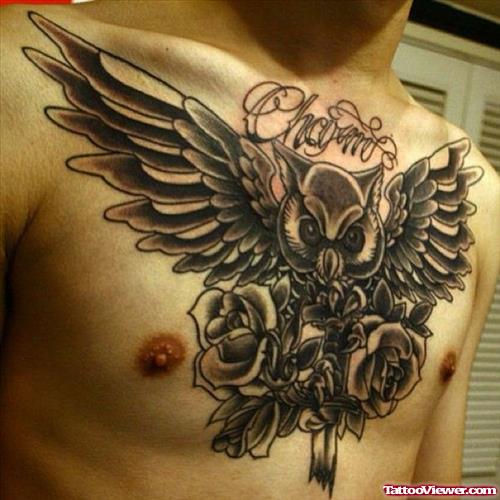 Black Ink Flying Owl Chest Tattoo