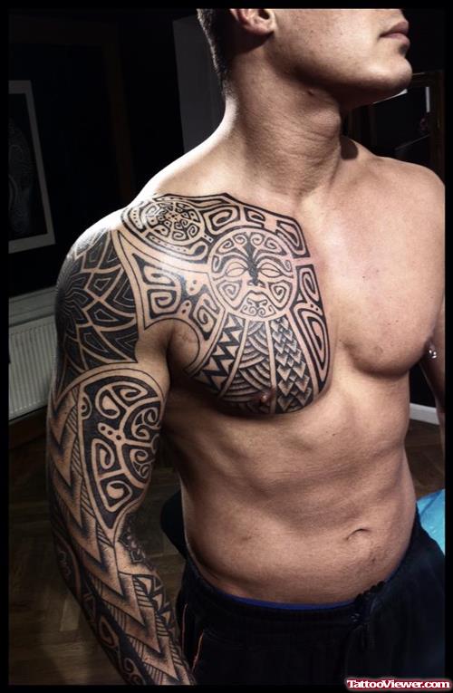Polynesiam Black Ink Chest And Sleeve Tattoo