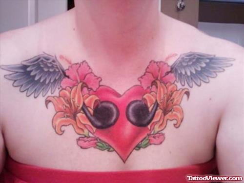 Pink Flowers And Winged Heart Chest Tattoo