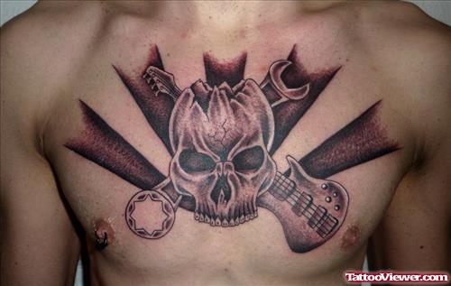 Grey Ink Skull With Guitar And Spanner Chest Tattoo
