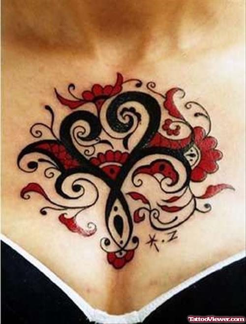 Tribal Heart And Red Flowers Chest Tattoo For Girls