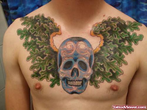 Green Leaves Wings Skull Chest Tattoo
