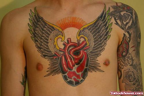 Winged Heart Colored Ink Chest Tattoo