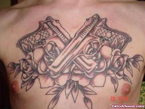 Grey Ink Flowers And Guns Chest Tattoo