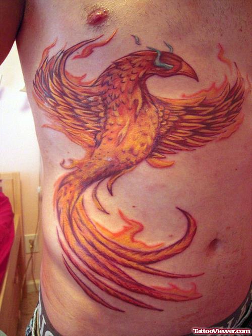 Colored Ink Flying Phoenix Chest Tattoo