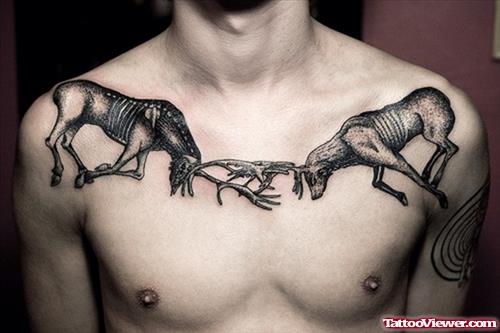 Grey Ink Fighting Deers Chest Tattoo