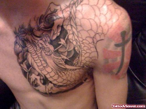 Awesome Grey Ink Dragon Chest Tattoo