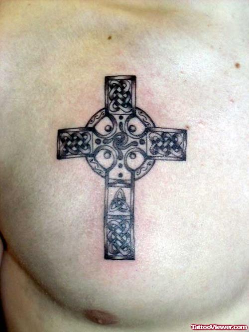 Amazing Grey Ink Cross Chest Tattoo