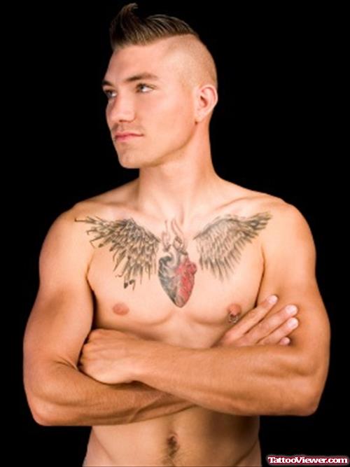 Winged Human Heart Chest Tattoo For Men