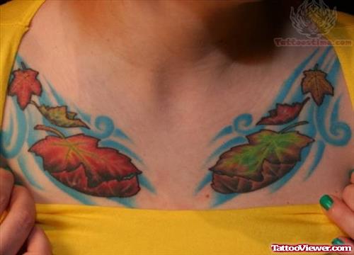 Aweome Colored Leaves Chest Tattoo For Girls