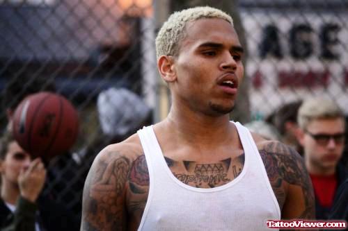 Grey Ink Diamon Tattoo On Chris Brown Chest Tattoo
