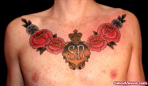 Colored Flowers And Crown Chest Tattoo