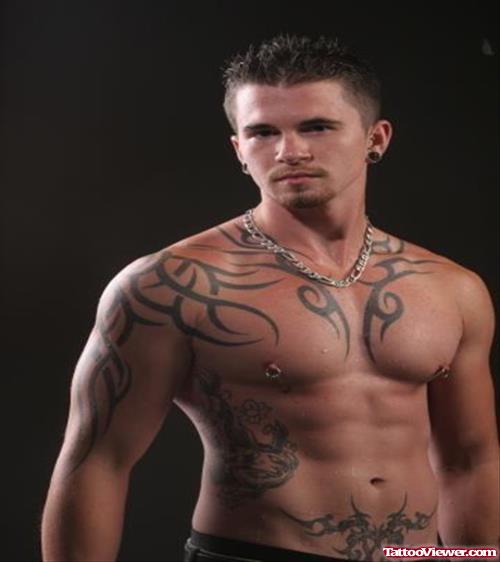 Beautiful Black Ink Tribal Chest Tattoo For Men