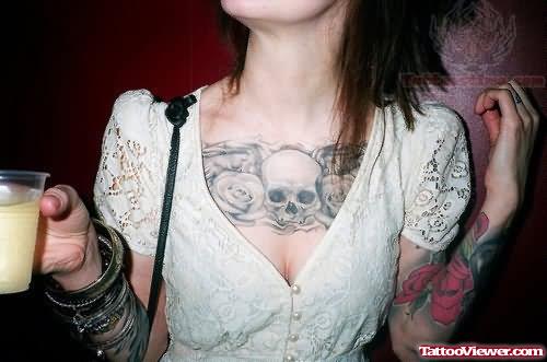 Rose And Skull Tattoo On Chest