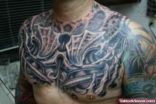 Biomechanical Grey Ink Tattoo On Men Chest