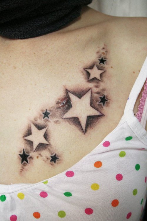 Girl With Stars Chest Tattoo