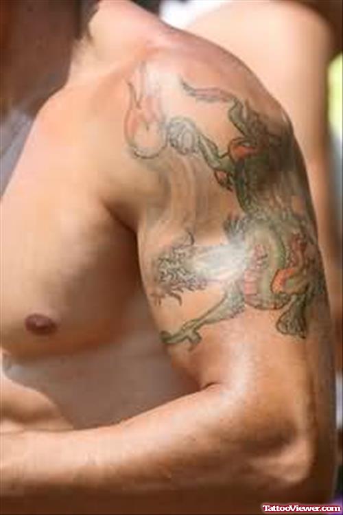 Awesome Chinese Tattoo On Muscles