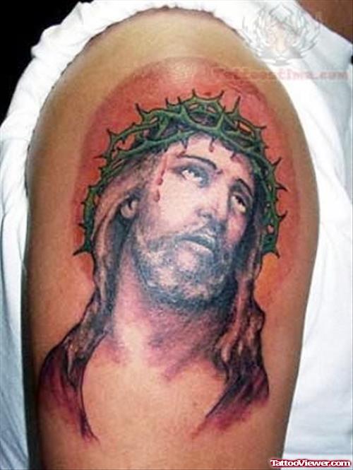 Unhappy Jesus Tattoo On Shoulder