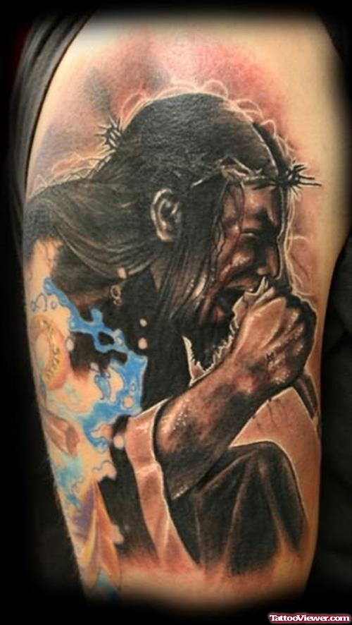 Jesus Injured Tattoo On Shoulder