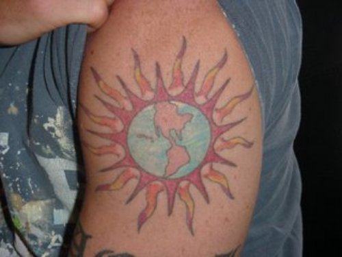 Color Tribal Sun Christian Tattoo On Left Bicep