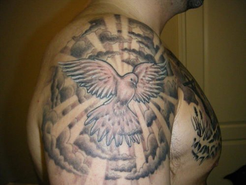 Grey Ink Flying Dove Christianity Tattoo on Shoulder