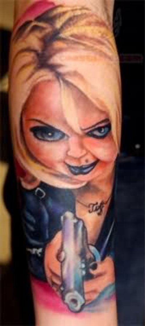 Color Ink Chucky Bride Tattoo On Arm
