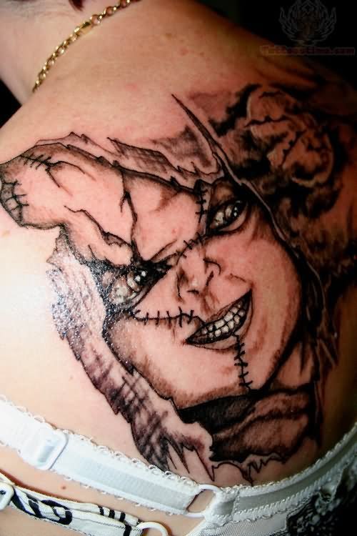Awesome Chucky Tattoo On Upperback
