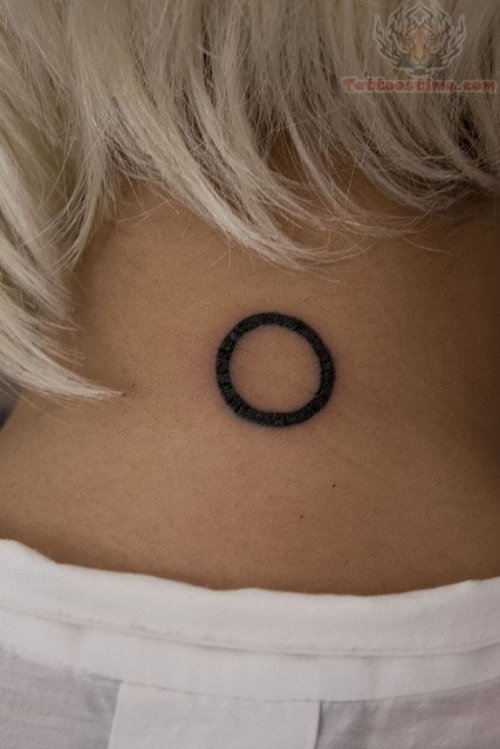 Tiny Circle Tattoo On Back Neck