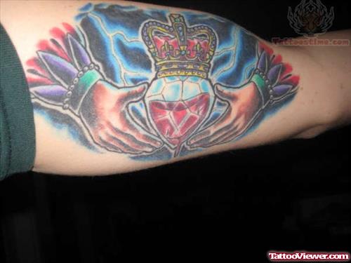Claddagh Tattoo On Muscles