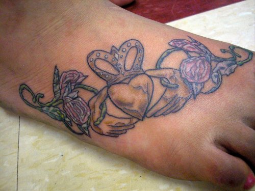 Claddagh Tattoo On Right Foot For Girls
