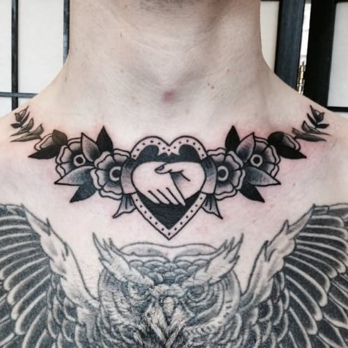 Amazing Claddagh And Owl Tattoo On Chest
