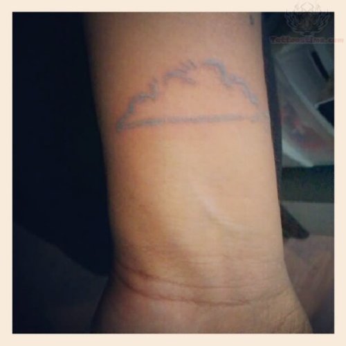 Cloud Tattoo On Left Wrist