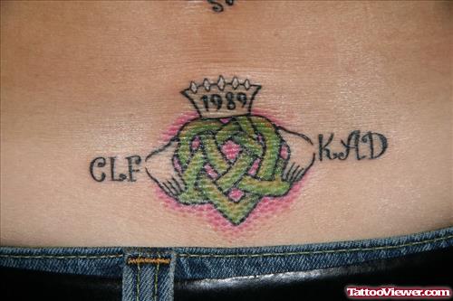 Clover Crown Tattoo On Lower Back