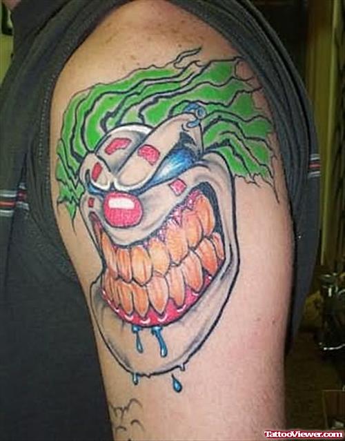 Big Teeths Clown Tattoo On Shoulder