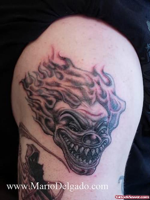 Flaming Skull Tattoo On Bicep