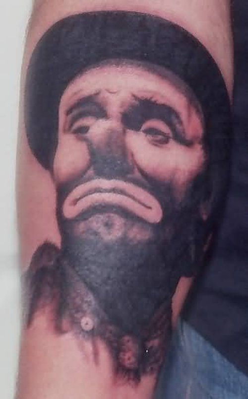 Sad Joker Clown Tattoo On Sleeve