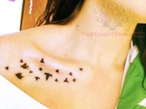 Black Ink Flying Words Collarbone Tattoo