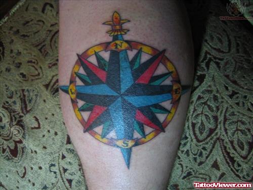 Blue And Red Compass Tattoo