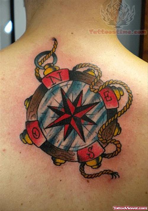 Colored Compass Tattoo On Upper Back