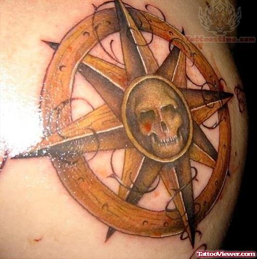 Skull In Wodden Compass Tattoo