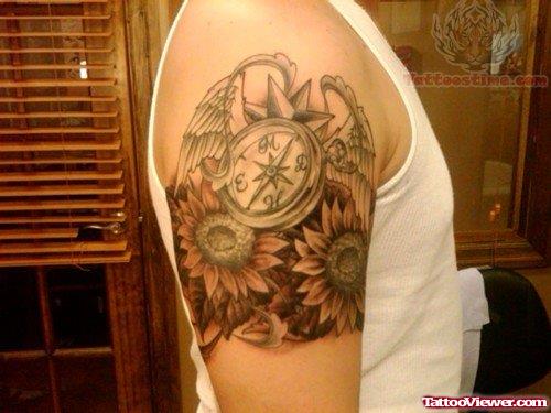 Flowers And Compass Tattoo On Bicep