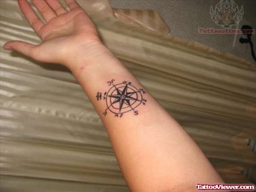 Grey Ink Compass Tattoo On Wrist