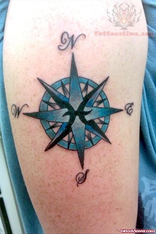 Blue Compass Tattoo On Bicep