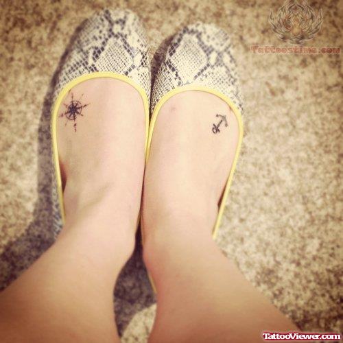 Small Anchor And Compass Tattoo On Feet