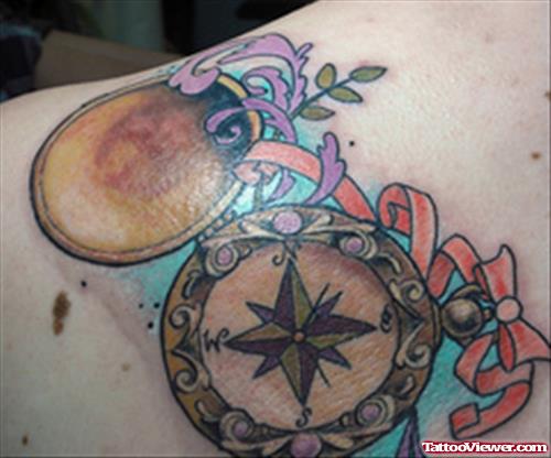 Ribbon And Compass Tattoo