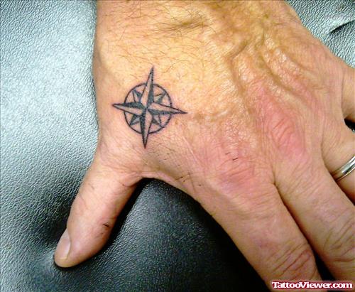 Tiny Compass Tattoo On Hand