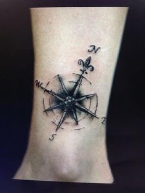 Black And Grey Compass Tattoo On Ankle