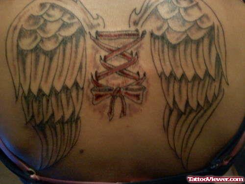 Wings And Corset Ribbon Tattoo