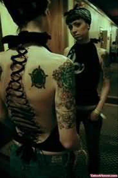 Corset Piercing & Tattoo On Back