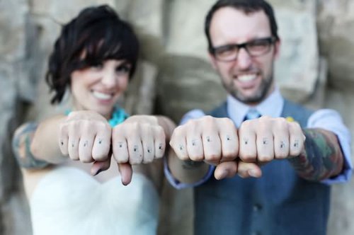 Couple With Fingers Tattoo